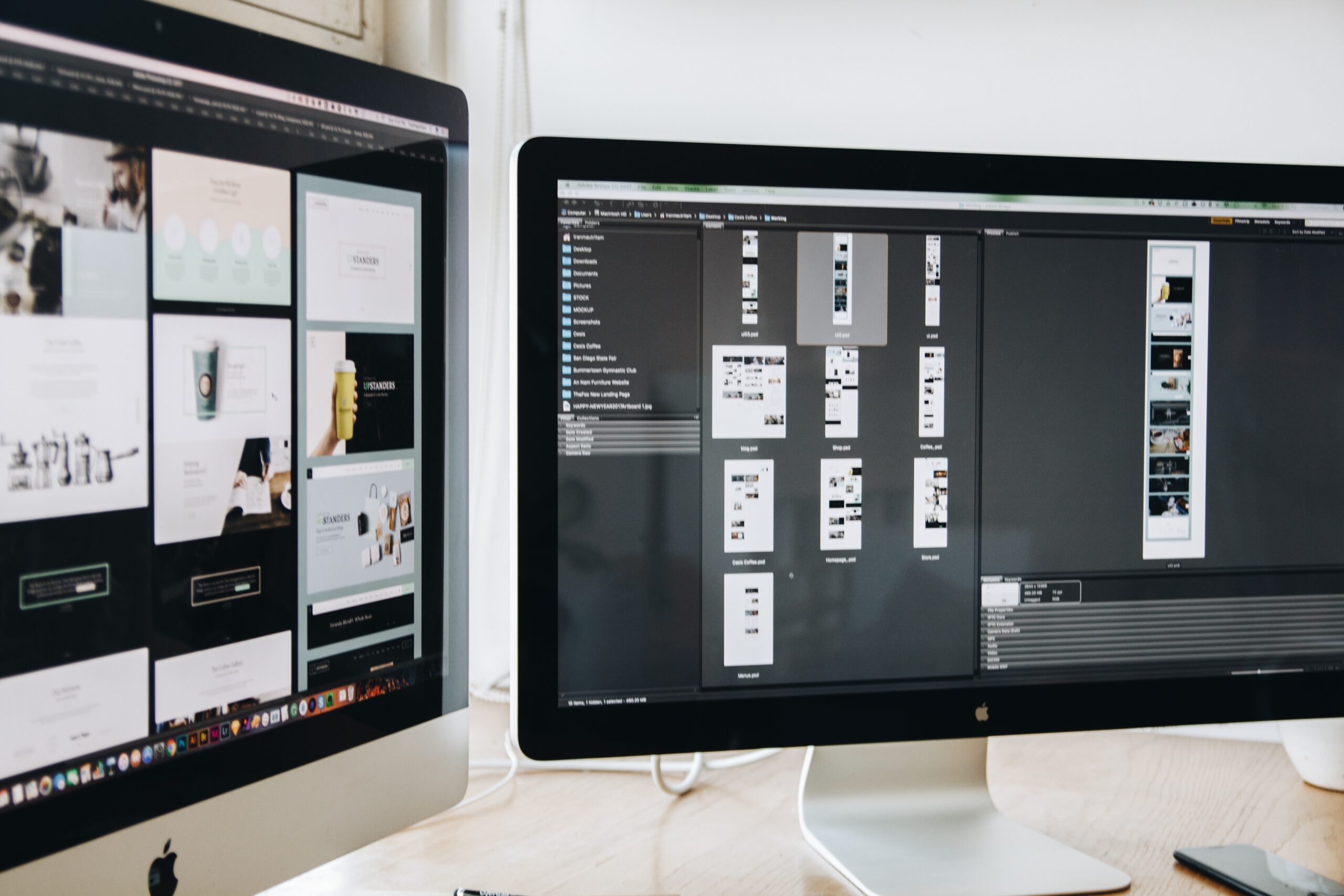 computer monitors setup with the design layout of a website